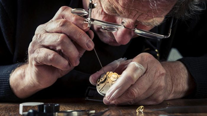 Who invented the first watch in the world?